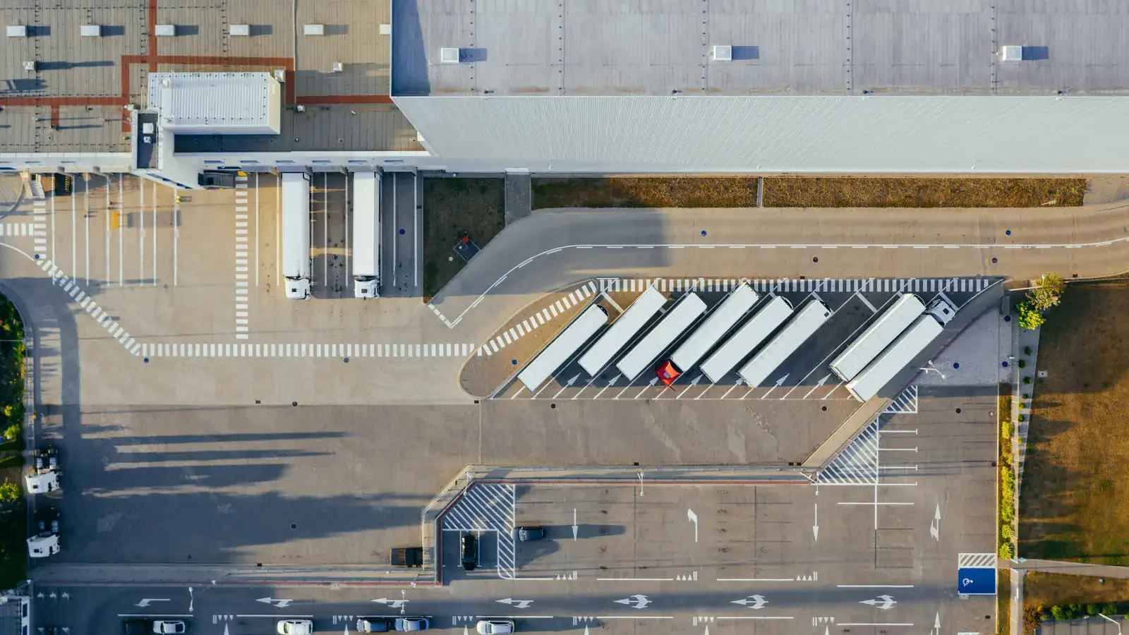 Aerial view of trucks parked at a distribution center