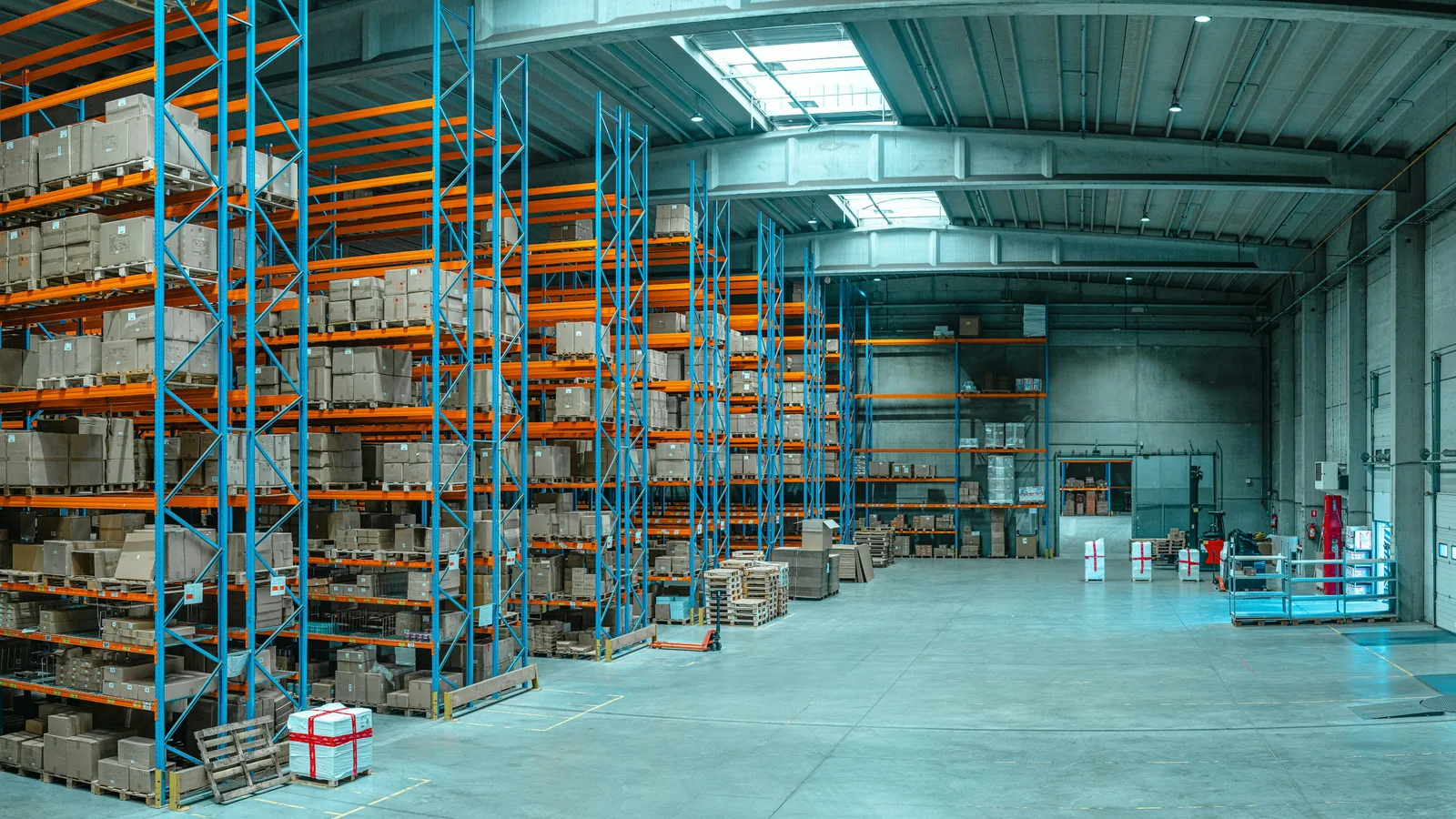 Tall warehouse shelving filled with cardboard boxes