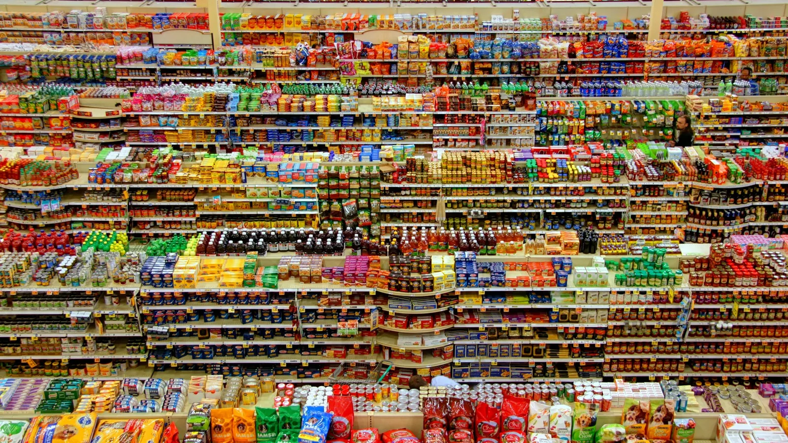 Supermarket shelves stocked with hundreds of different products