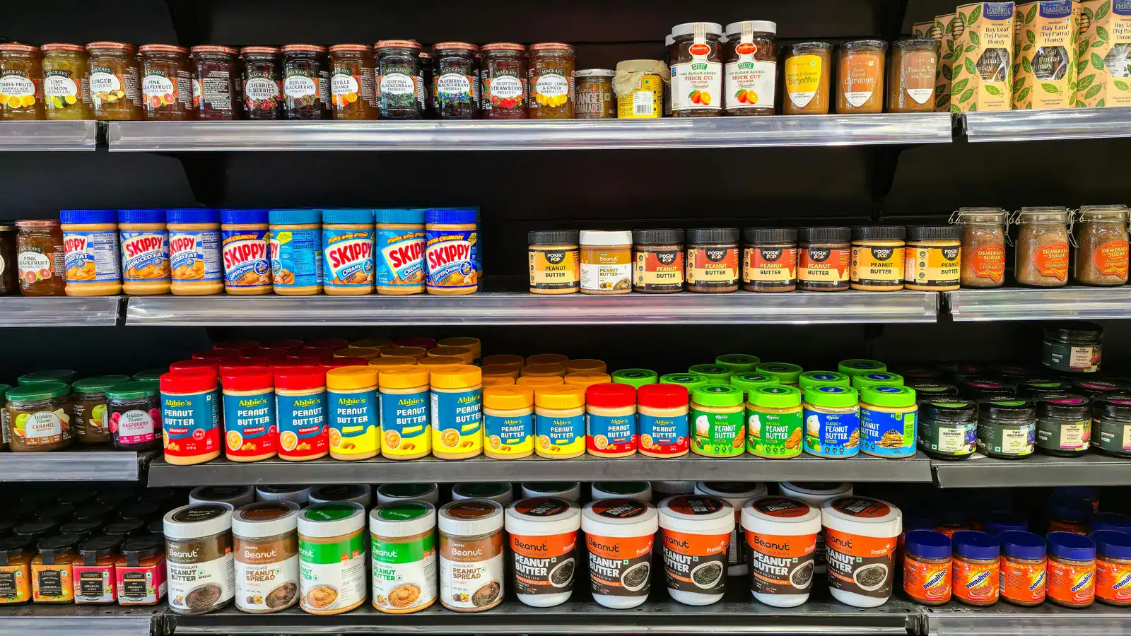 Store shelves stocked with many spices and seasonings