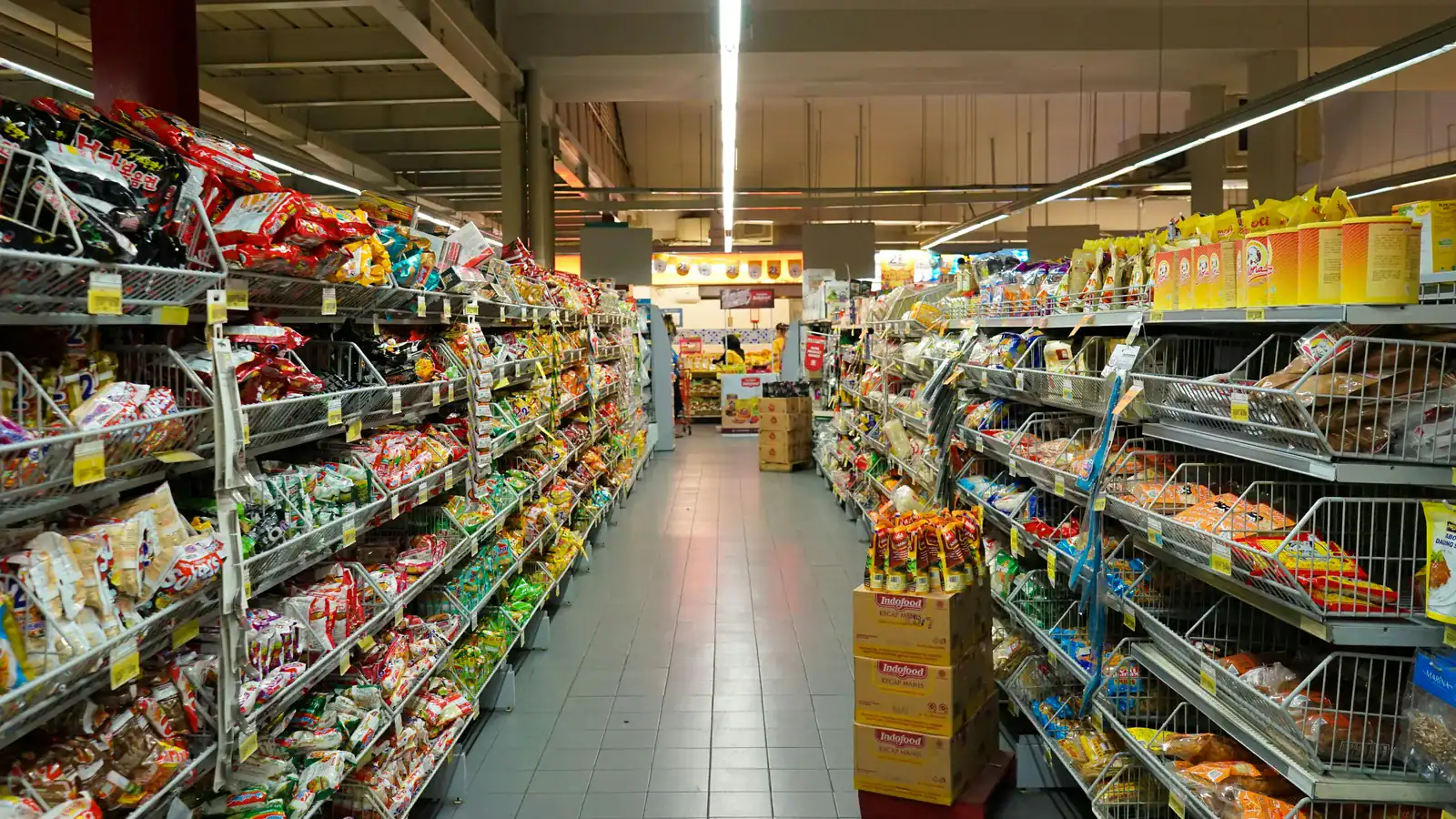 Grocery store aisle stocked with food products